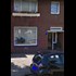 Last week I came across a car with the weird swirl logos. Today i went to the house and saw that the windows had the exact same swirles. This can't be a coincidence